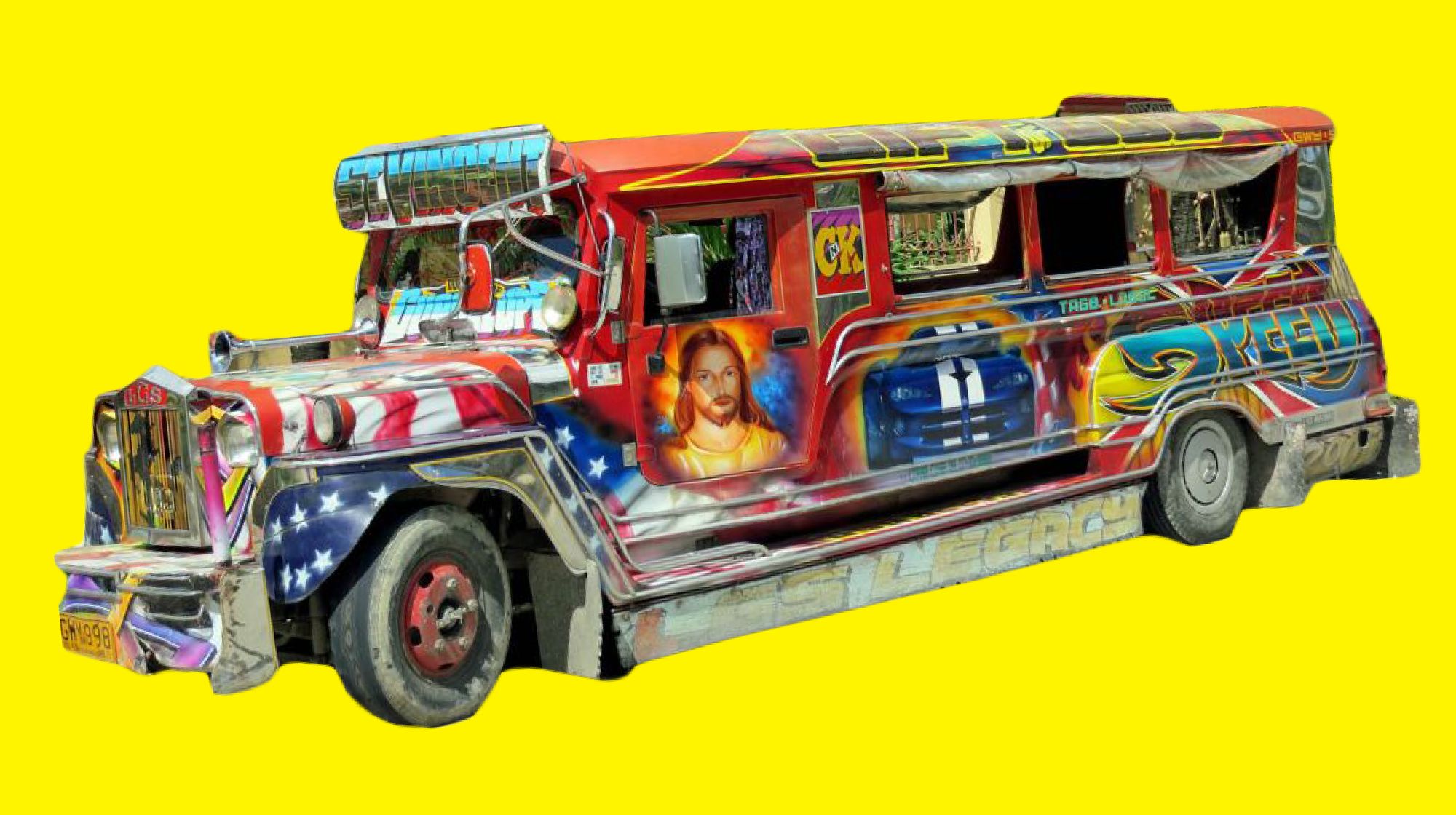 A heavily decorated Jeepney. It is colorfully spray-painted with images of a race-car, a portrait of Jesus, a U.S.A flag, and graffiti.
